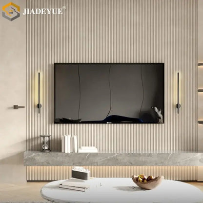 Black-framed flat-screen tv mounted on beige wall with sleek decorbites led modern wall lamps with built-in switch