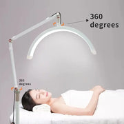 White adjustable DecorBites LED Moon beauty floor lamp with 360-degree articulated LED ring light for facial treatments