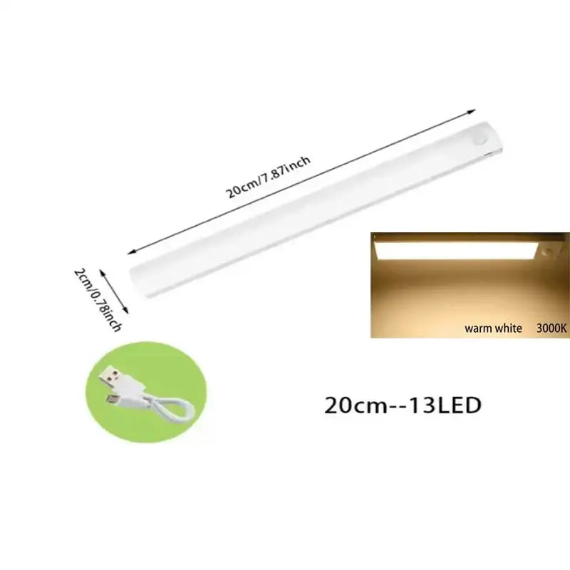 A sleek white 20cm decorbites led motion sensor cabinet light with warm white dimmable rechargeable illumination