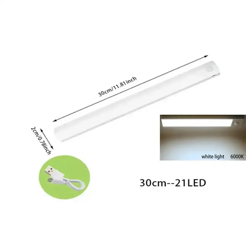 A sleek white 30cm decorbites led motion sensor cabinet light with dimmable feature and usb-c charging cable