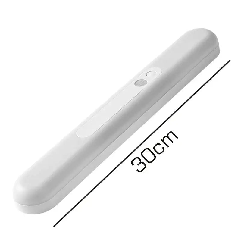 DecorBites™ rechargeable white led motion sensor light with smooth plastic body and two control buttons 30cm long