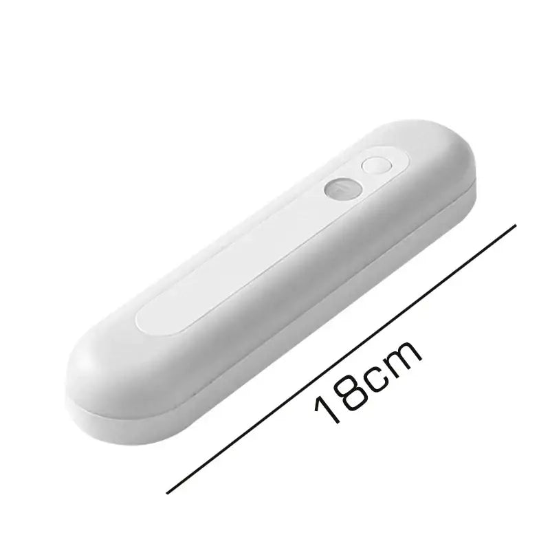 DecorBites™ rechargeable white plastic motion sensor light with sleek curved design and two control buttons