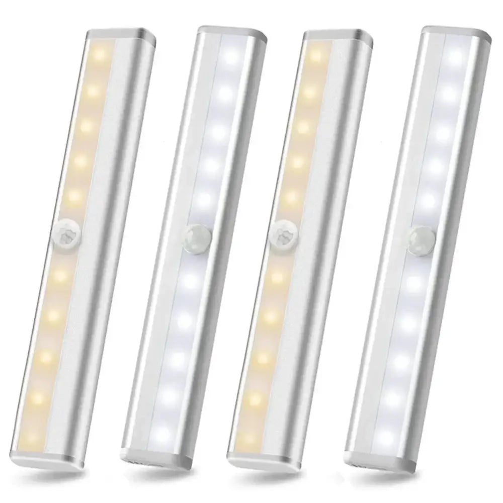 Set of four sleek silver DecorBites led motion sensor night lights with warm and cool white illumination for cabinets