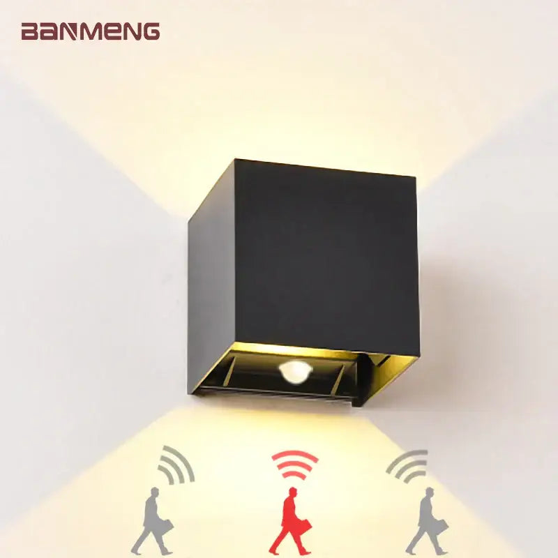Black and gold DecorBites LED motion sensor wall lamp with cube shape and modern design for indoor outdoor use