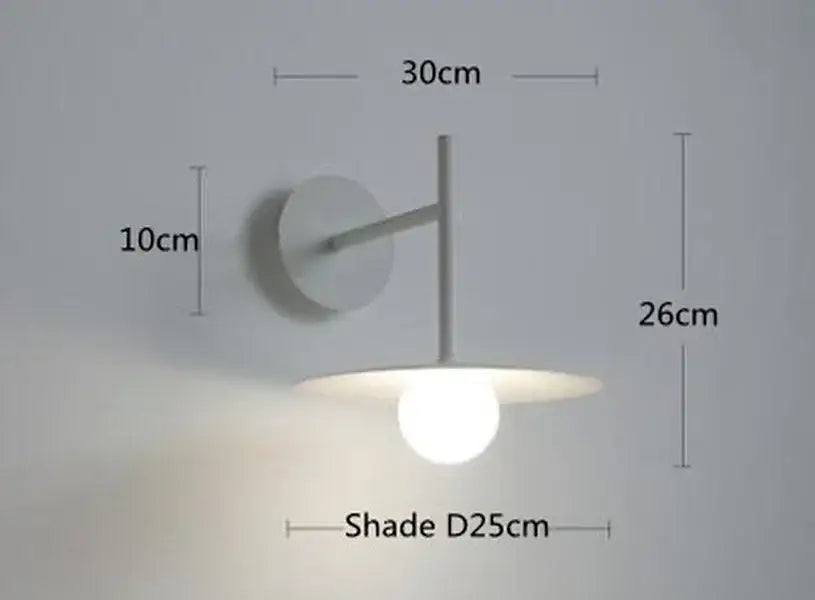 Minimalist white DecorBites led movable arm wall lamp with circular base and round glass shade for indoor bedroom lighting