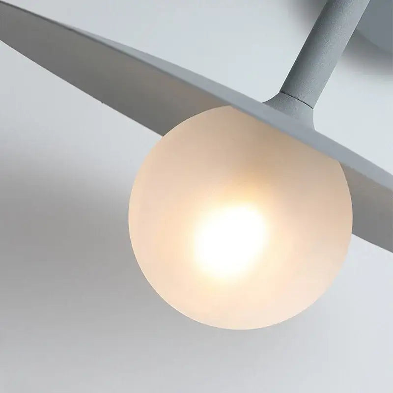 Decorbites led movable arm wall lamp with frosted glass globe and gray metal arms for bedroom indoor lighting