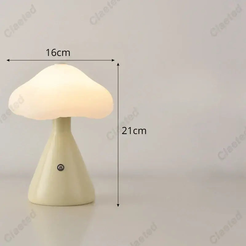Cream-colored DecorBites LED mushroom night light with smooth glossy finish and softly diffused warm light for bedside decor