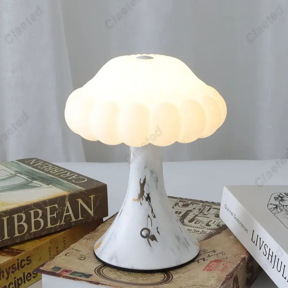 A white marble-finish decorbites led mushroom night light with soft diffused glow for kids room decor