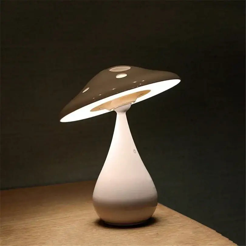 Sleek decorbites led mushroom table lamp with glossy dark gray polka dot cap and white tapered base for bedroom lighting