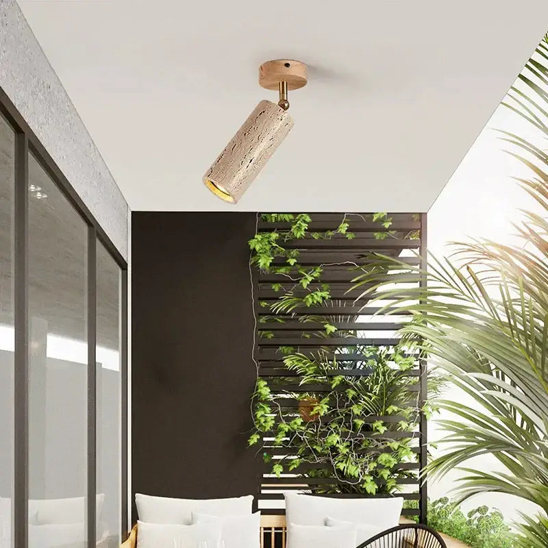 A decorbites led natural stone spotlight with walnut log wood texture and brass finish for ceiling and wall use