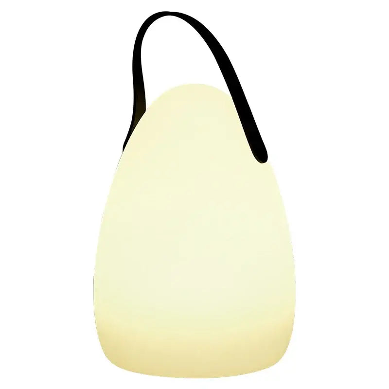 Cream-colored decorbites™ led night light with teardrop shape and black fabric handle for home and outdoor use