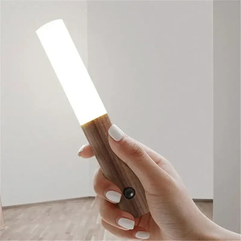 Decorbites led night light with a warm wood-textured handle and white cylinder ideal as a bedside night light