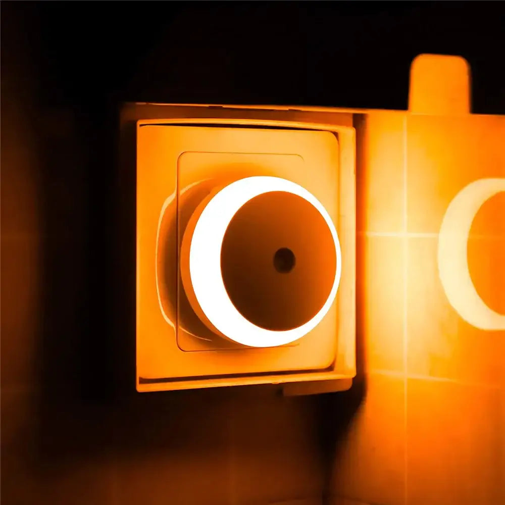 Decorbites led night light smart sensor with warm orange circular led in modern square housing for home use