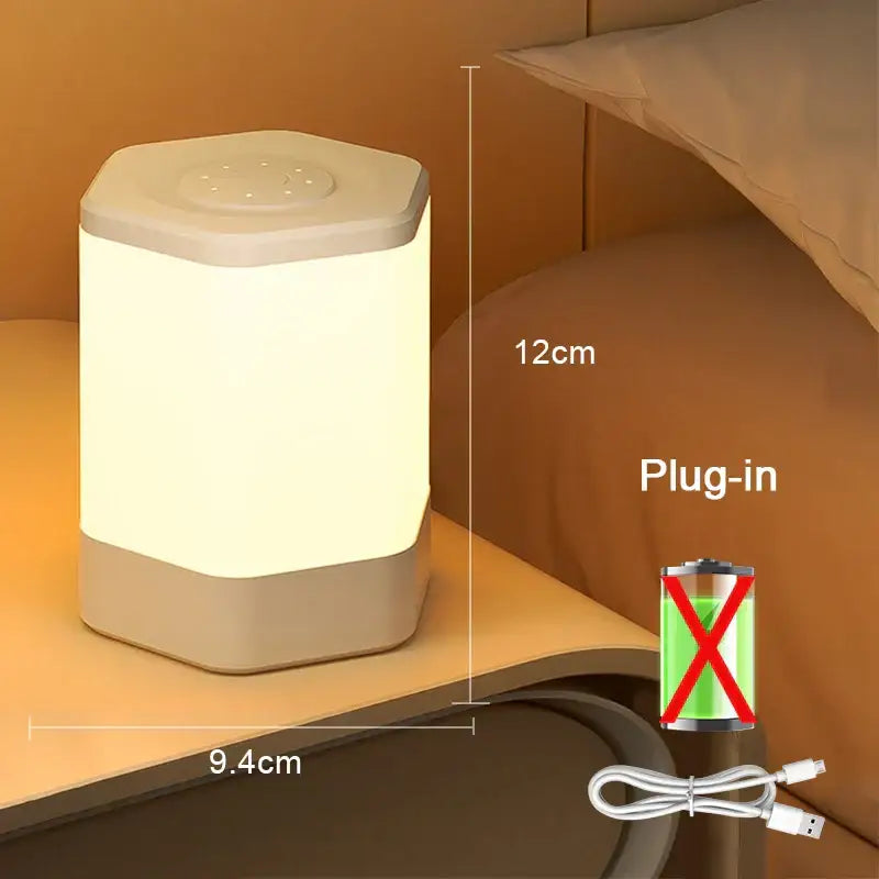 A sleek hexagonal decorbites led night light with soft white glow and beige plastic casing for bedside table use