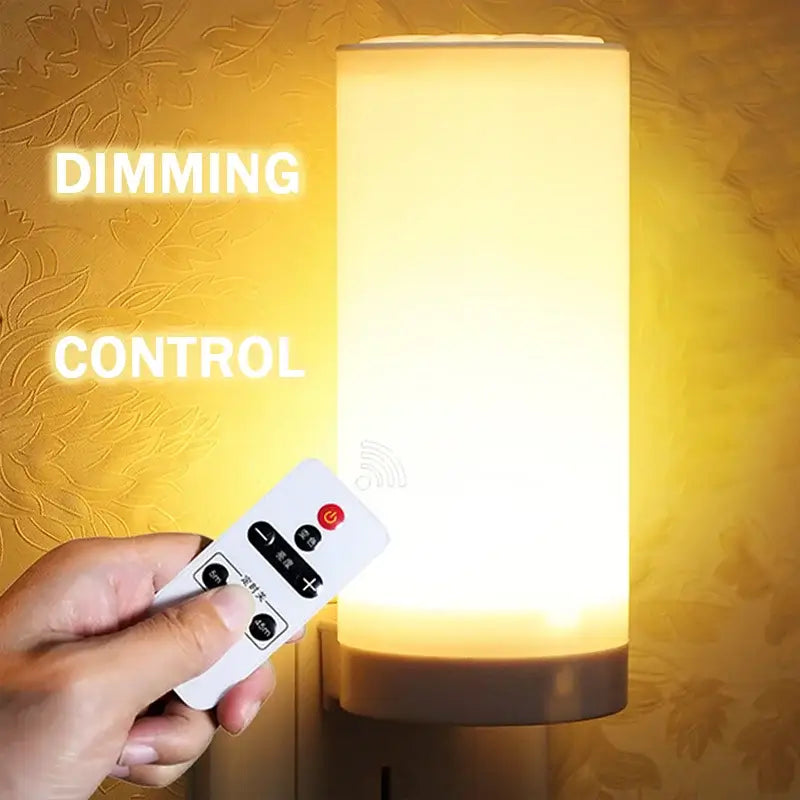 A warm cylindrical decorbites led night light with soft yellow glow and remote dimming control for bedroom bedside
