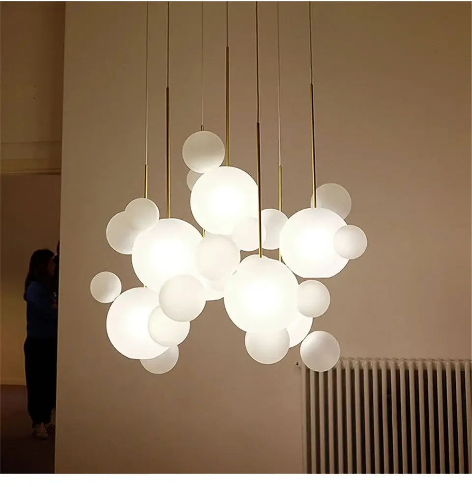 DecorBites™ LED Nordic bubble chandelier with frosted white glass spheres and gold-toned rods for home lighting