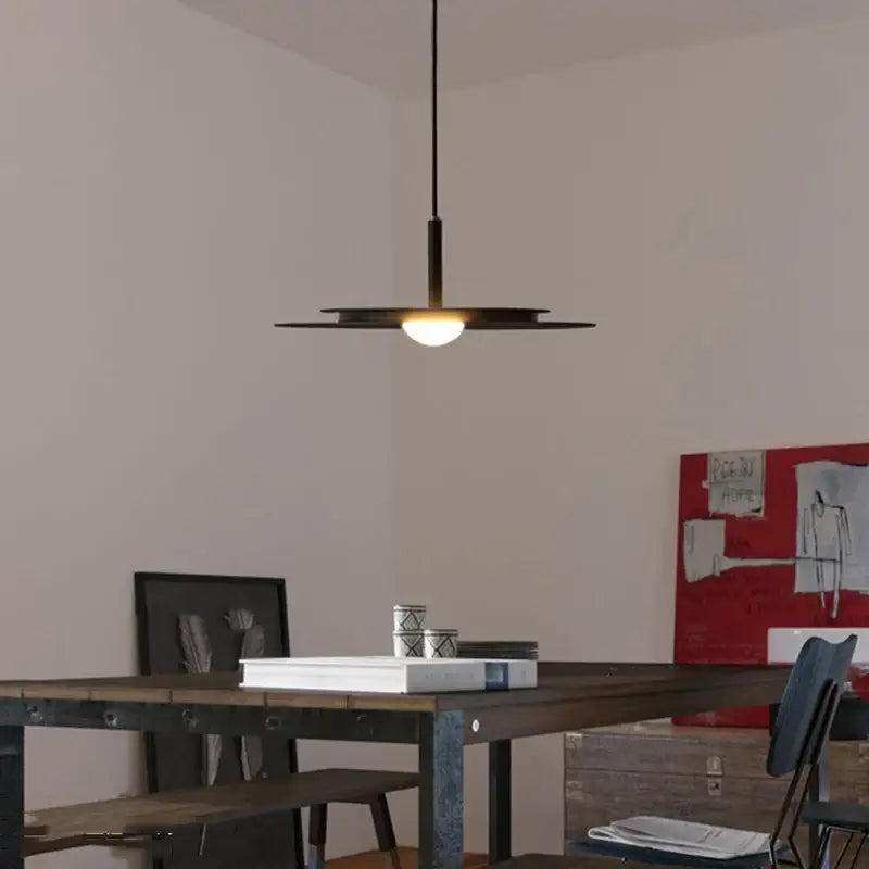 Modern black DecorBites™ LED Nordic flying saucer chandelier with sleek disc-shaped design and warm glow light