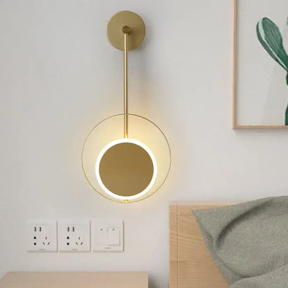 Gold-toned circular decorbites led nordic wall light with sleek minimalist design and illuminated ring for indoor lighting