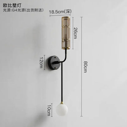 Modern wall sconce with black metal base and gold cylindrical shade by decorbites led nordic for luxury living spaces