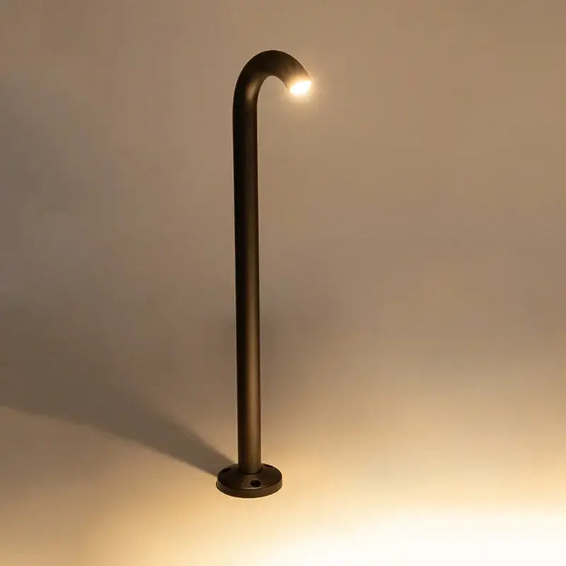 Black metal cane-shaped bollard light with warm curved LED outdoor aluminum light for modern landscape by DecorBites LED Outdoor
