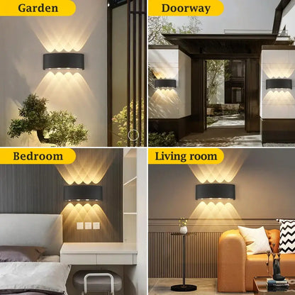 Black rectangular DecorBites™ LED outdoor wall light with three integrated LED lights casting warm directional glow