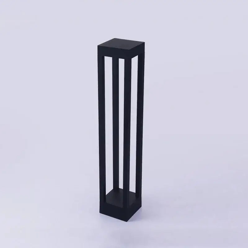 Black rectangular decorbites led outdoor display stand with vertical slats for showcasing outdoor lawn light products