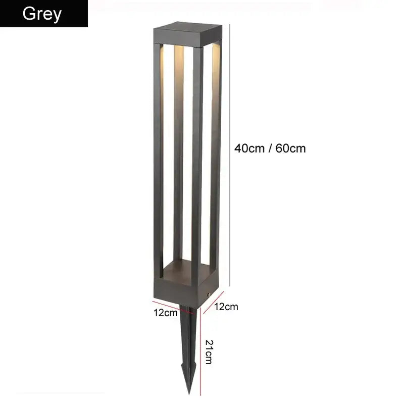 Grey rectangular decorbites led outdoor lawn light with vertical slats and pointed stake base for garden pathway lighting