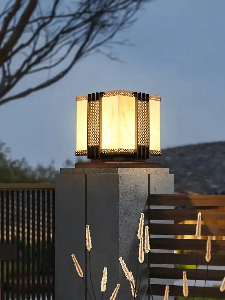 Warm-toned decorbites led outdoor street lamp with hexagonal marble design and intricate lattice for pillar fence lighting