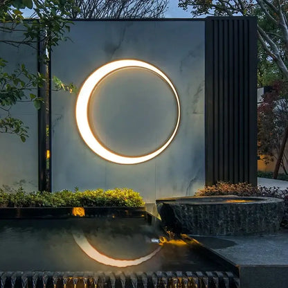 A glowing decorbites led outdoor wall lamp with warm soft illumination for courtyard balcony lighting