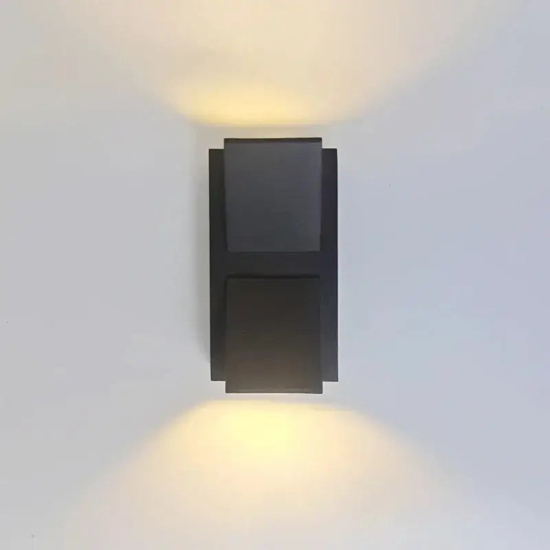 Modern black rectangular DecorBites led outdoor wall light with two angled fixtures for warm led outdoor porch illumination
