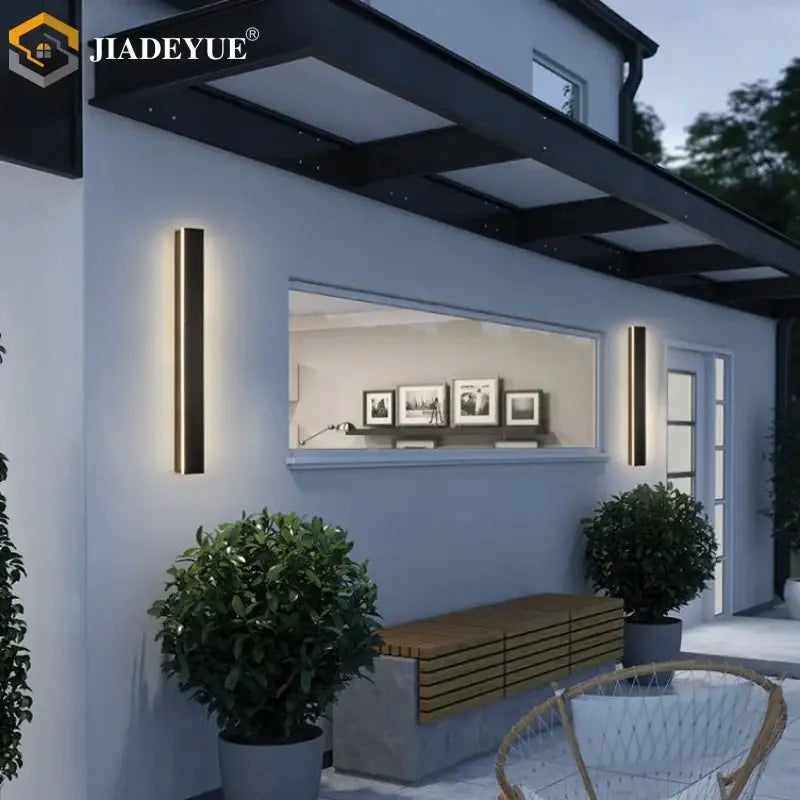 Modern black rectangular decorbites led outdoor wall lamp with warm ambient lighting for balcony garden porch use