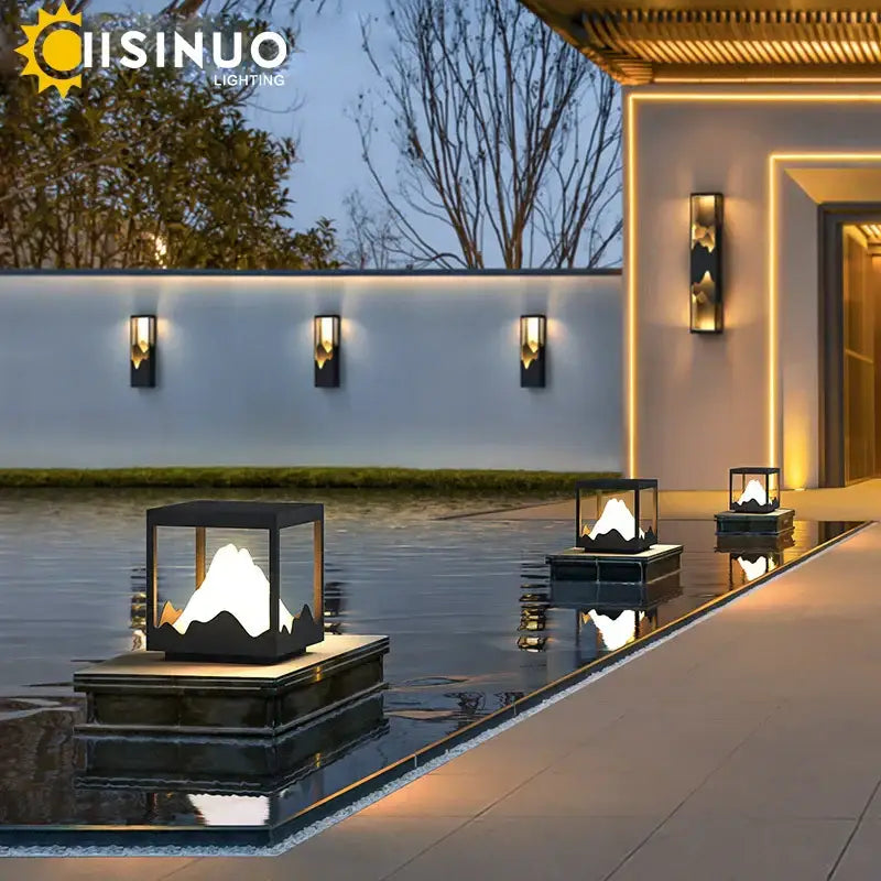 Black mountain-shaped decorbites led outdoor wall lamp with glass enclosure and warm led light for patio ambiance