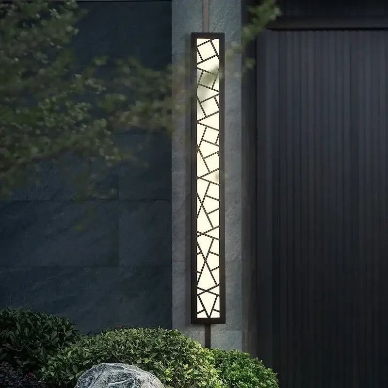 Modern black-framed decorbites™ outdoor wall lamp with geometric glass panels and warm led light for villa porch use