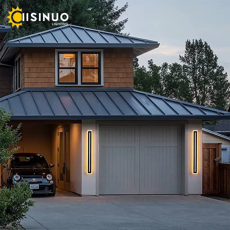 Modern vertical led outdoor wall lamps by DecorBites with sleek black aluminum frames and warm white light on garage door sides
