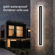 DecorBites™ black and white aluminum LED outdoor wall lamp with sleek minimalist design and IP65 waterproof rating