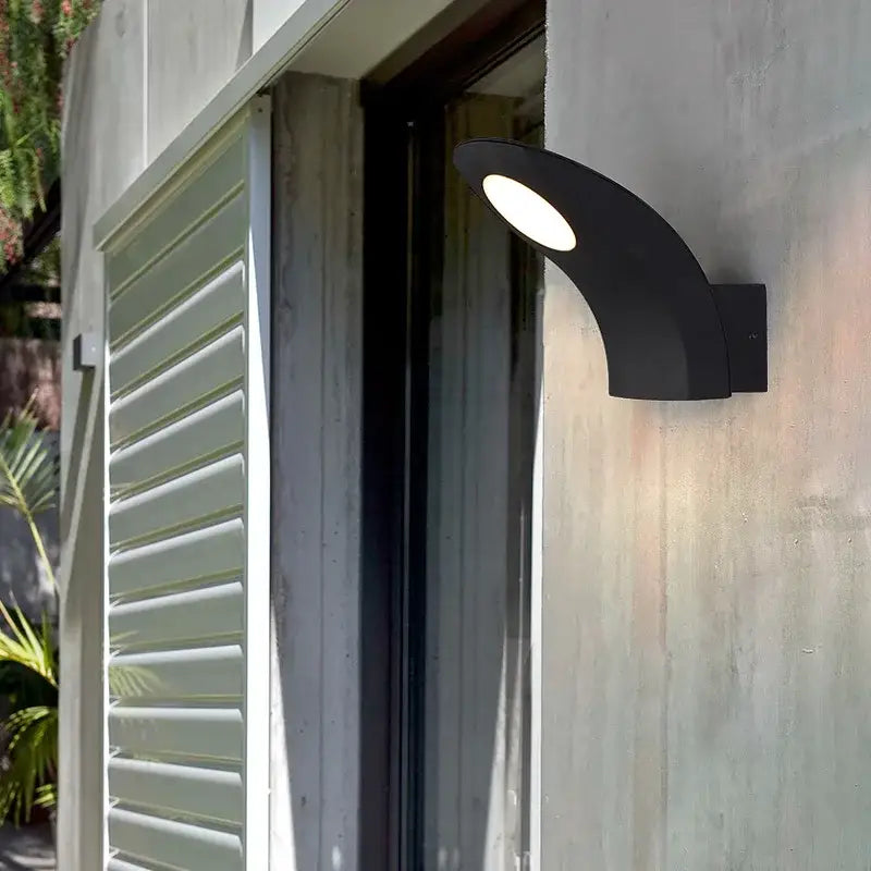 Black curved decorbites™ led outdoor wall lamp with bright white illuminated face modern waterproof sconce