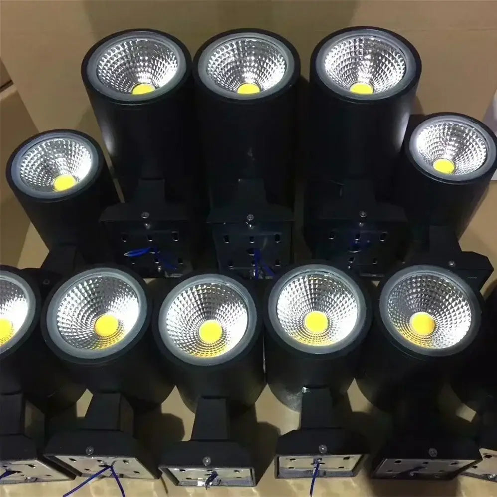 Decorbites™ black cylindrical led outdoor wall lamp with reflective silver interior and yellow diodes for porch lighting