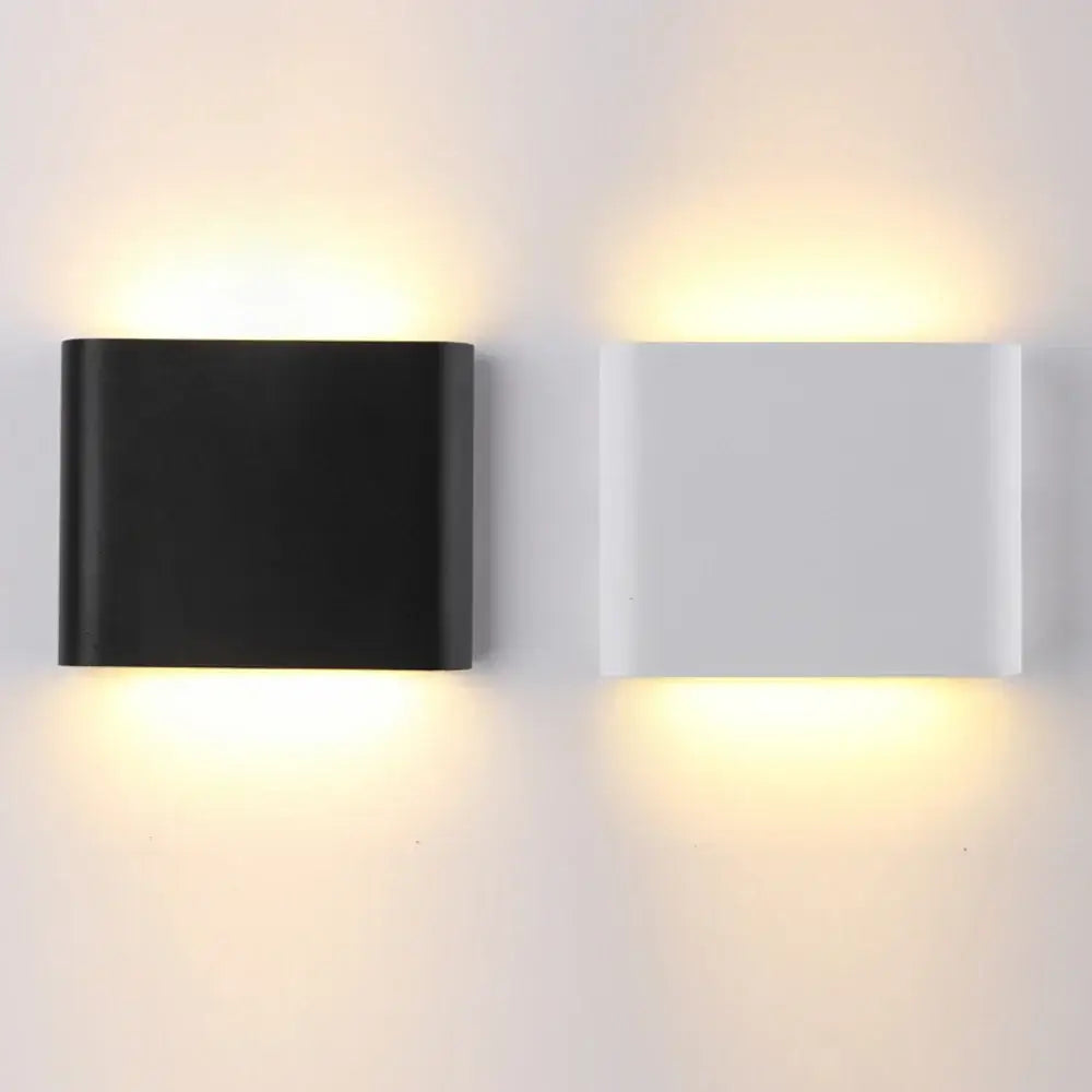 Modern rectangular decorbites led outdoor wall lamps in black and white finishes with warm ambient glow for indoor corridor lighting