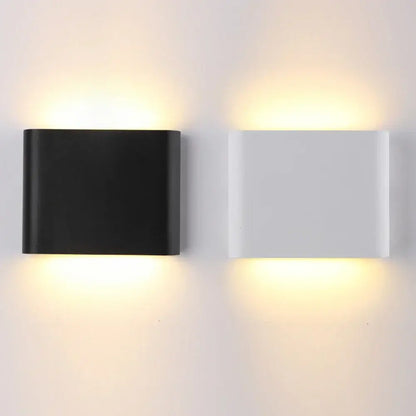 Modern rectangular decorbites led outdoor wall lamps in black and white finishes with warm ambient glow for indoor corridor lighting