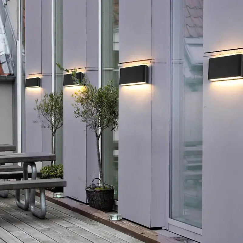 Modern black rectangular decorbites led outdoor wall light with warm diffused lighting and waterproof aluminum build