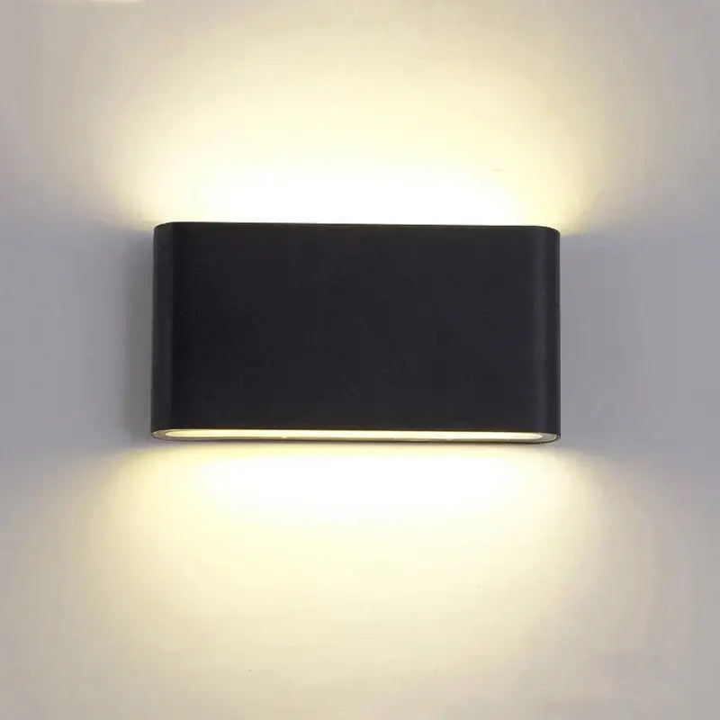 Black rectangular decorbites led outdoor wall light with sleek aluminum design and warm ambient glow IP65 waterproof