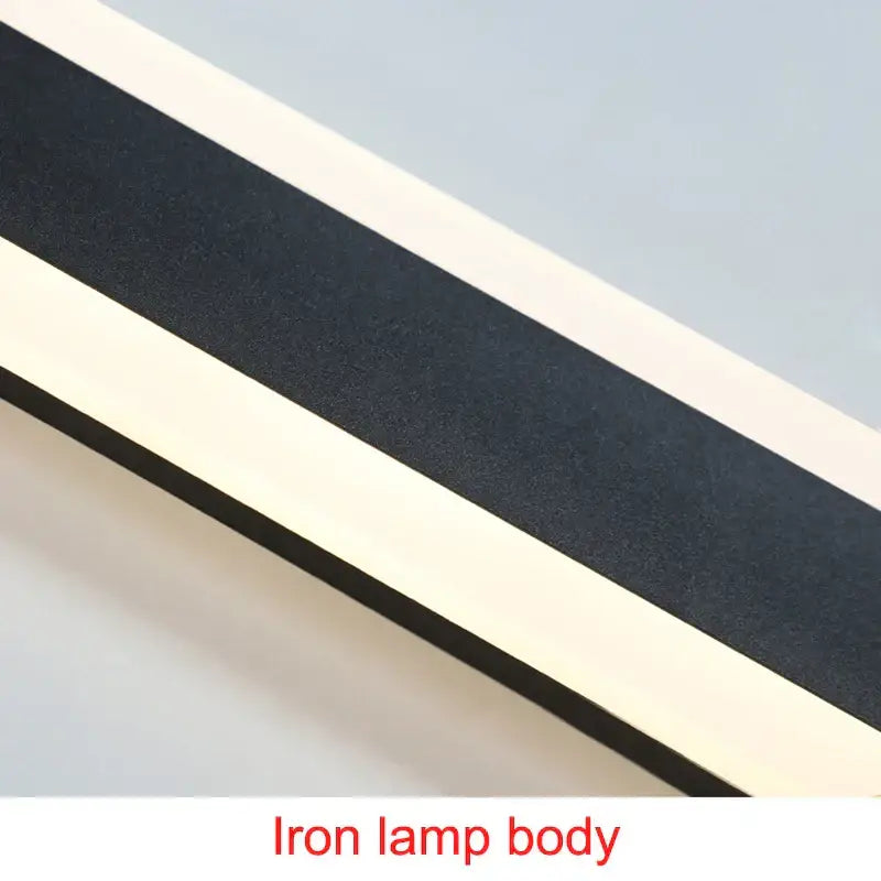 The decorbites led outdoor wall light features a sleek iron body with black and cream horizontal stripes for modern outdoor use