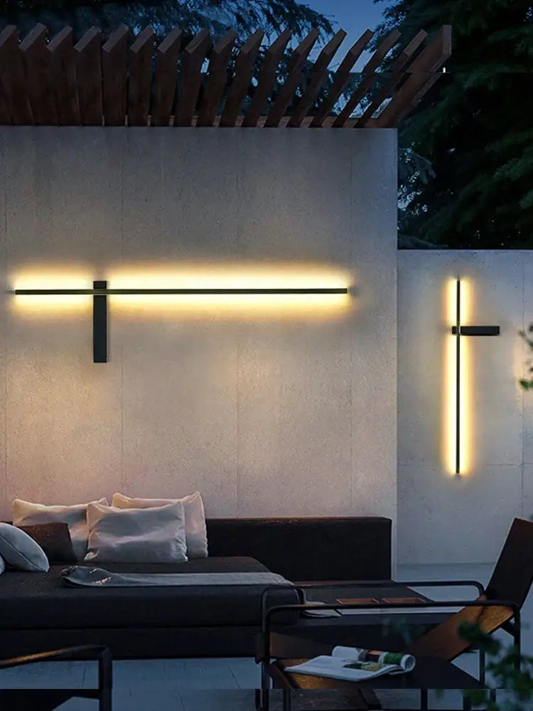 DecorBites™ modern outdoor wall light with sleek black metal frame and warm yellow led glow for villa garden patio