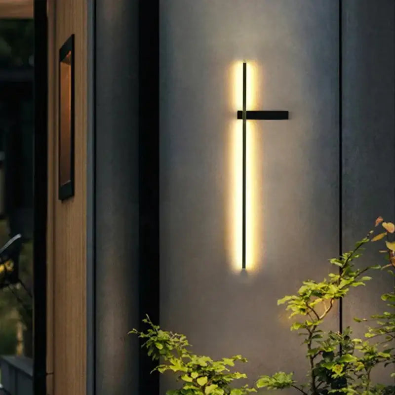 Modern black decorbites led outdoor wall light with vertical illuminated bar and horizontal accent for villa patio