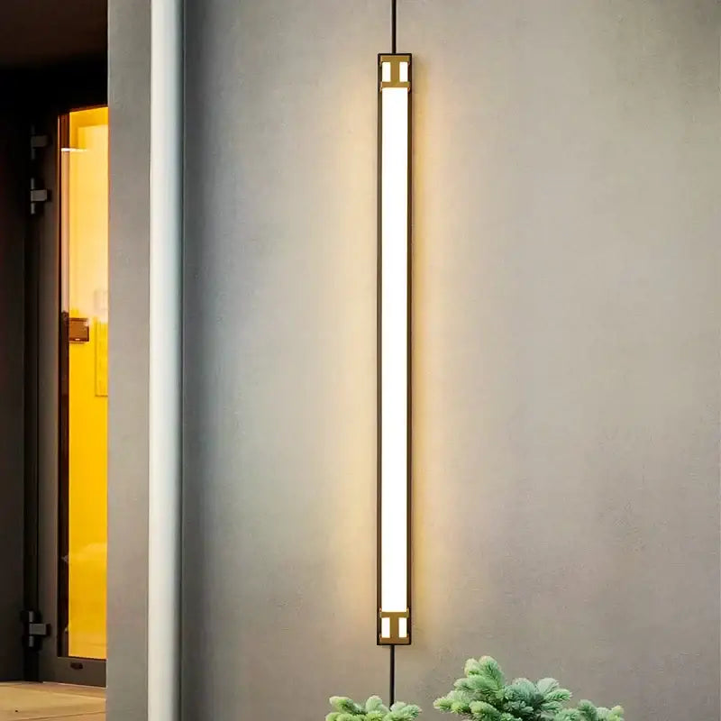 A sleek black and gold decorbites led outdoor wall lamp with waterproof ip65 rating and warm white led outdoor wall light illumination