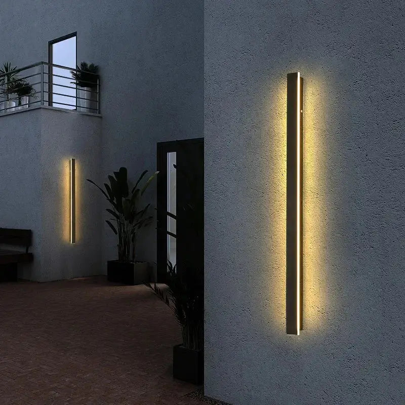 Modern gold-toned decorbites led outdoor wall light emitting warm ambient glow for porch garden patio use