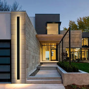 Modern minimalist decorbites led outdoor wall light in sleek black with warm ambient glow for porch and garden lighting