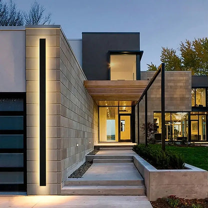 Modern minimalist decorbites led outdoor wall light in sleek black with warm ambient glow for porch and garden lighting