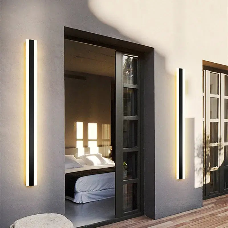 Modern black and gold linear decorbites led outdoor wall light with sleek minimalist design for garden and balcony lighting