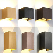 Modern square outdoor wall light by DecorBites with brushed metal finish and warm LED lighting for porch and garden